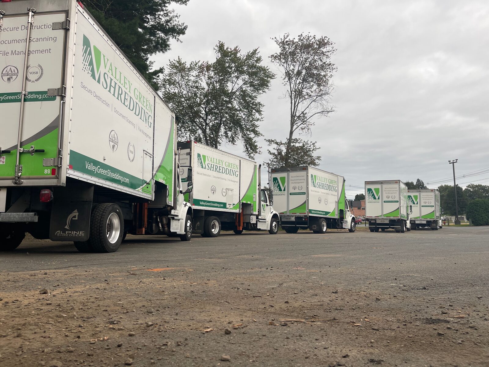 Valley Green Shredding fleet of mobile on-site shredding trucks lined up and ready for service in Western Massachusetts